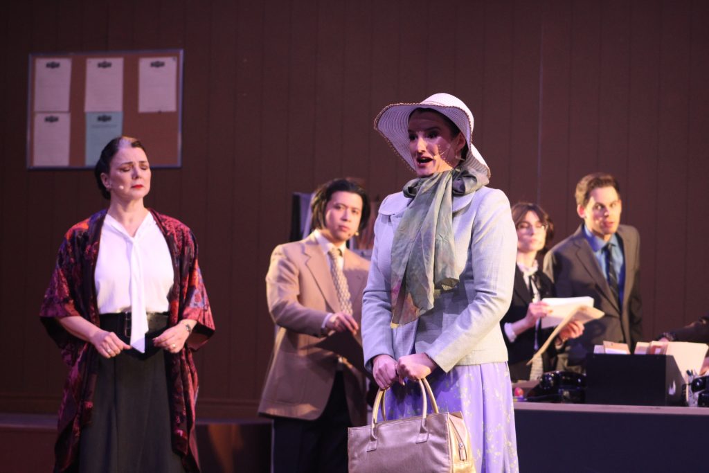 Judy and Violet introduce themselves with Office Workers in the background.